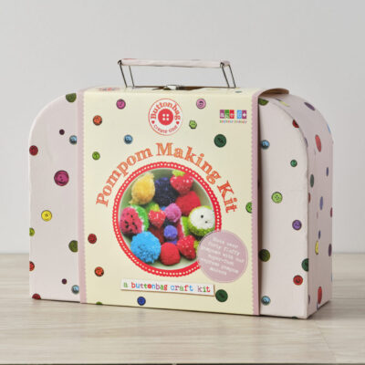 pom pom suitcase buttonbag